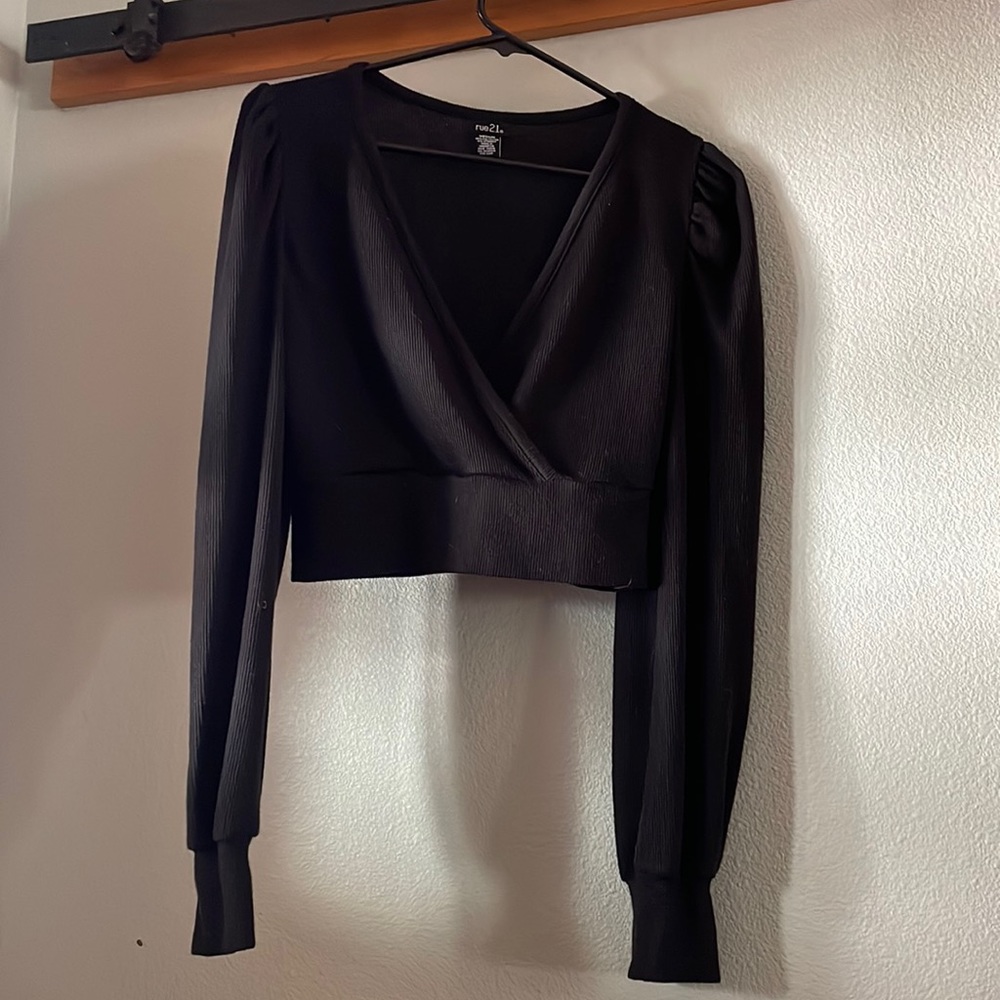 Black half wrap long sleeve crop top.